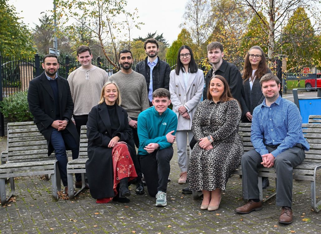 EY and SERC staff with some of the participants on the assured skills academy, pictured outside SERC Bangor Campus